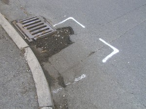 Halfway: The council has marked this pot hole for repair.